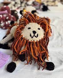 Buy Kenana Knitters - Rascal Baby Lion - natural by Kenana Knitters - at Hamish + Grace