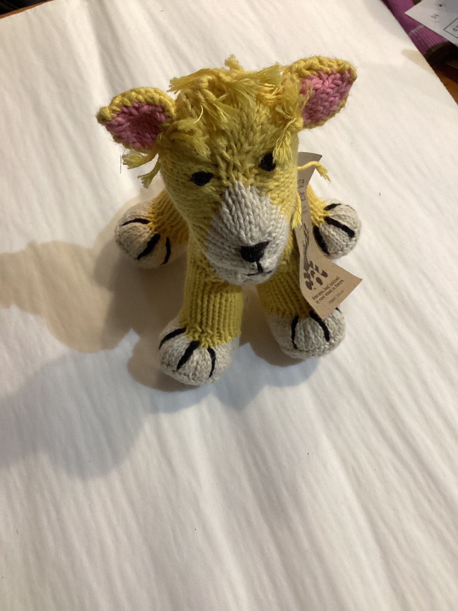 Buy Kenana Knitters - Rascal Baby Lion - Yellow by Kenana Knitters - at Hamish + Grace