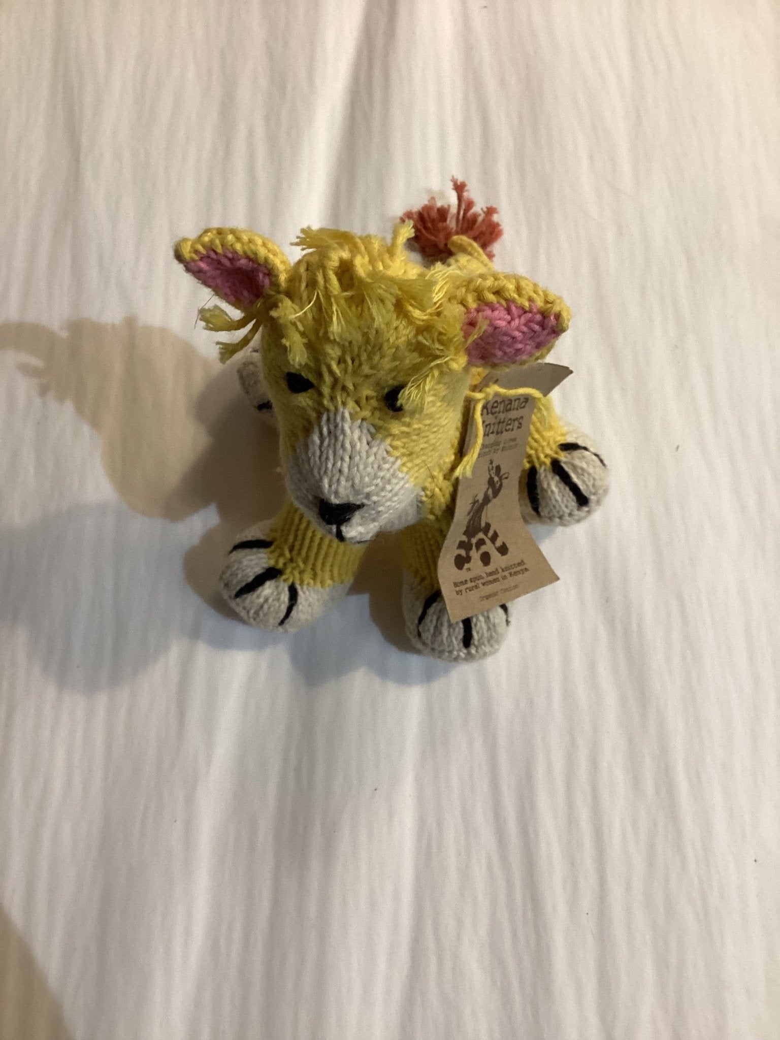 Buy Kenana Knitters - Rascal Baby Lion - Yellow by Kenana Knitters - at Hamish + Grace