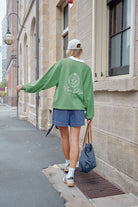 Buy Ceres Life - Wren Rugby Sweat - Pistachio white club logo by Ceres Life - at Hamish + Grace