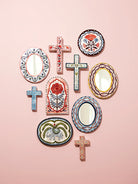 Buy Jones and Co - Samira Small Cross Pink Eyes by Jones & Co - at Hamish + Grace