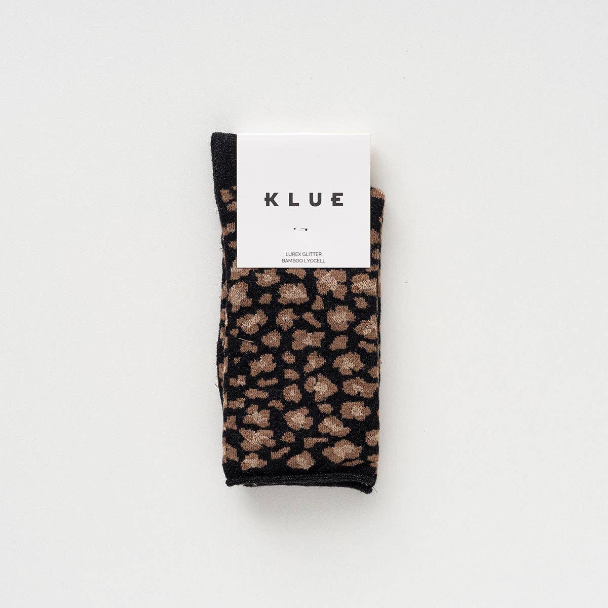 Buy KLUE Glitter Lurex socks in eco - friendly Lyocell | Leopard black: 36 - 40 by KLUE - at Hamish + Grace