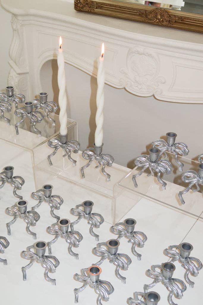 Buy Silver Coated Brass Bow Candle Holder by Love Ally - at Hamish + Grace